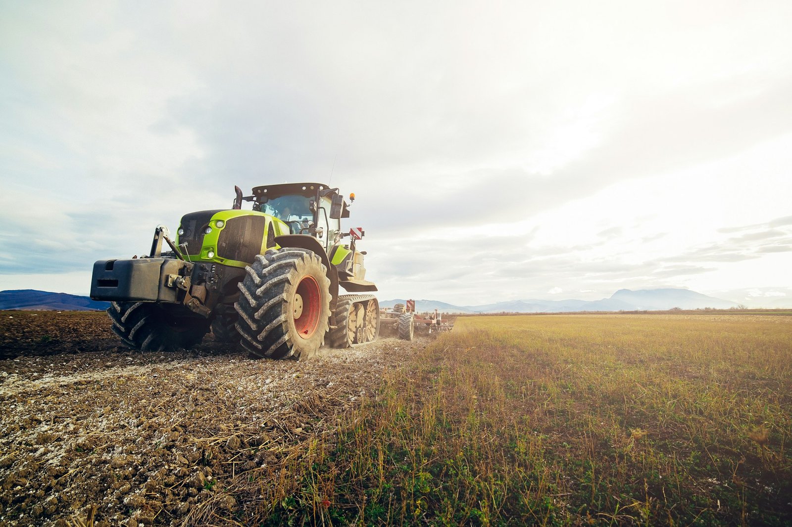 Tractor preparing the land for planting